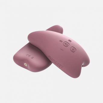 Two Momcozy Lactation Massagers in Purple, showcasing the front-facing control buttons and the side view with the magnetic charging port and medical-grade liquid silicone texture, available at CHS Pharmacy UAE.